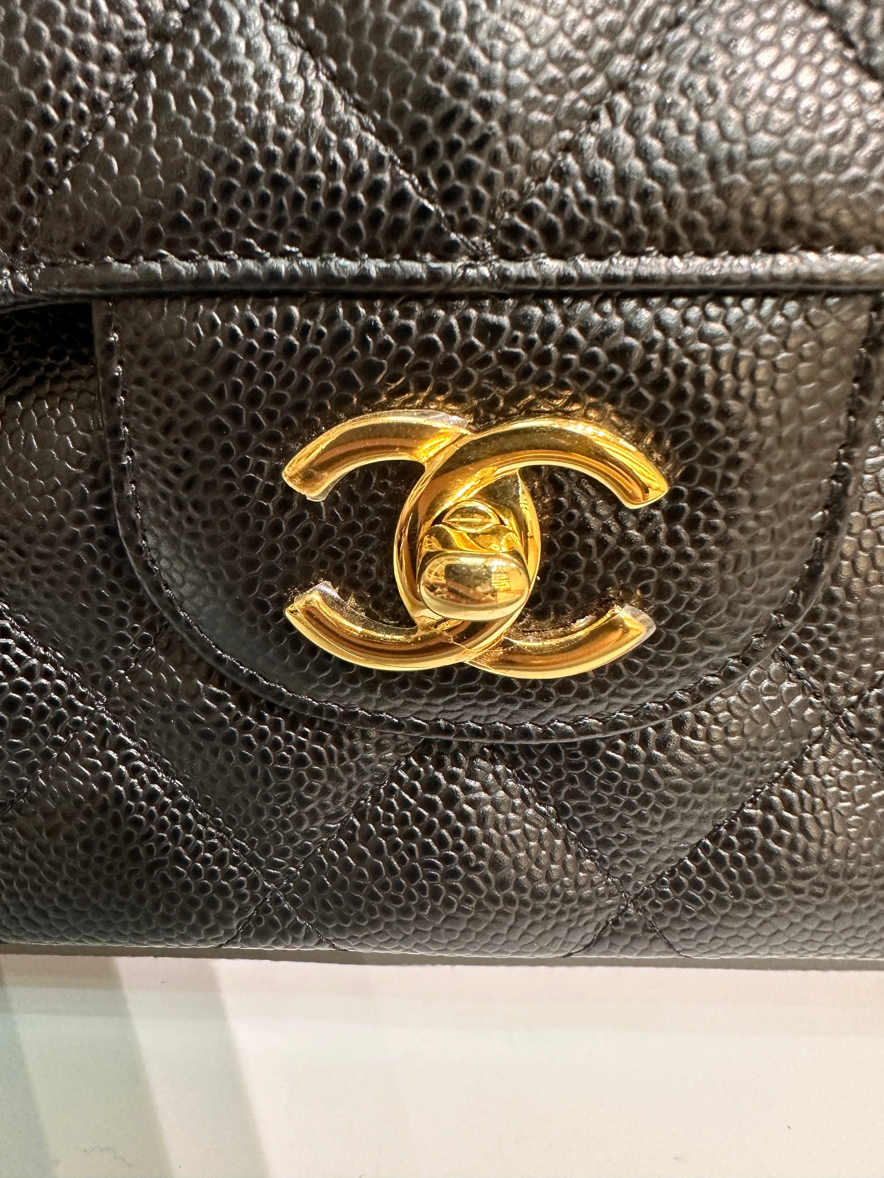 Chanel Jumbo Classic Double Flap Bag Black Caviar Gold Hardware